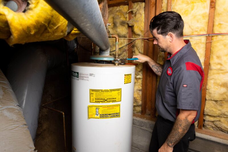 a Gotelli team member providing water heater repair services
