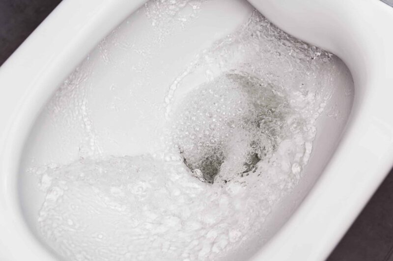 bubbles in the bowl of a home's toilet