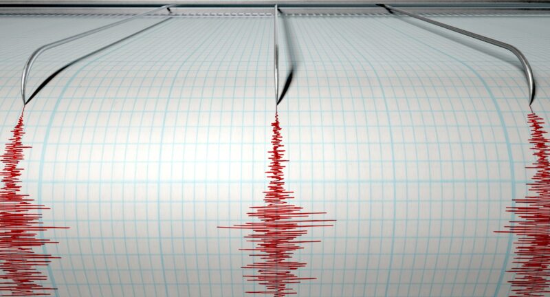 a seismograph measuring the activity of an earthquake