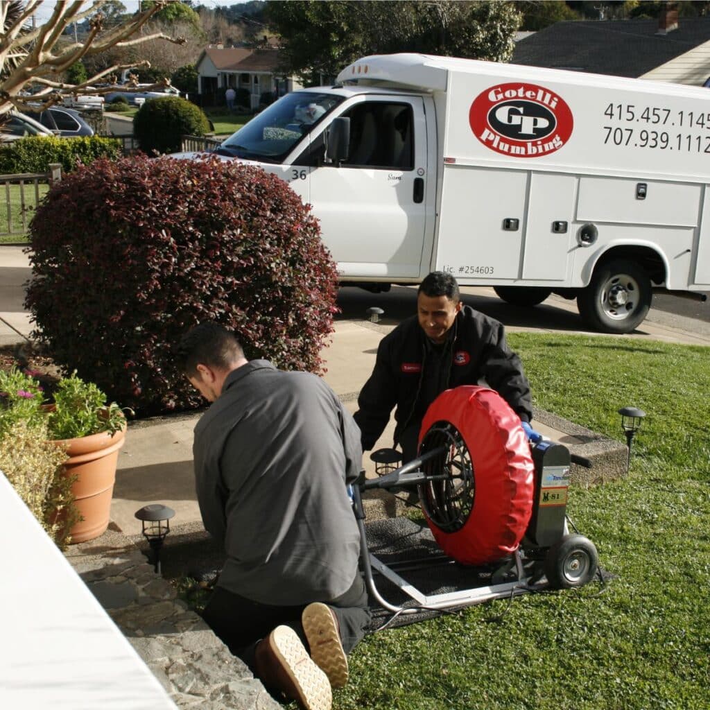 gotelli plumbing technicians performing a plumbing service in a california home