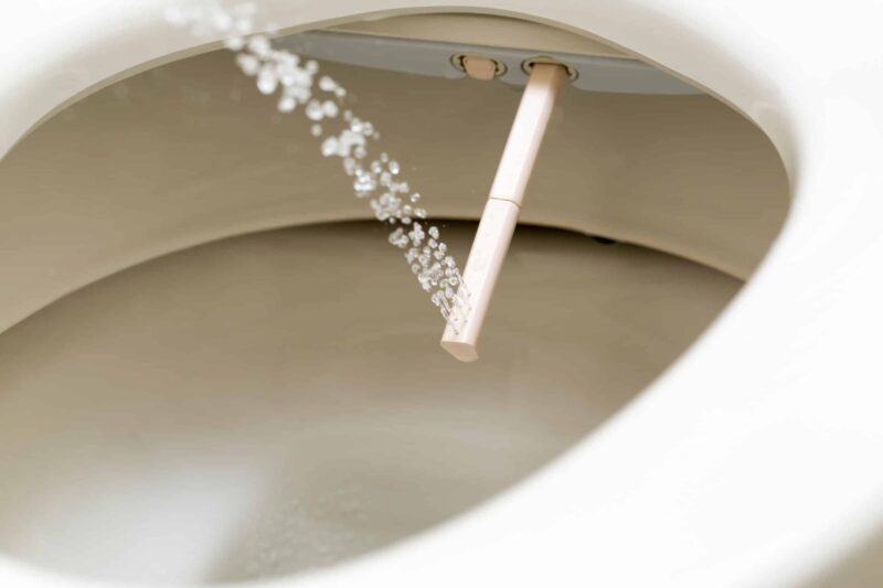 water spraying upwards from a bidet toilet