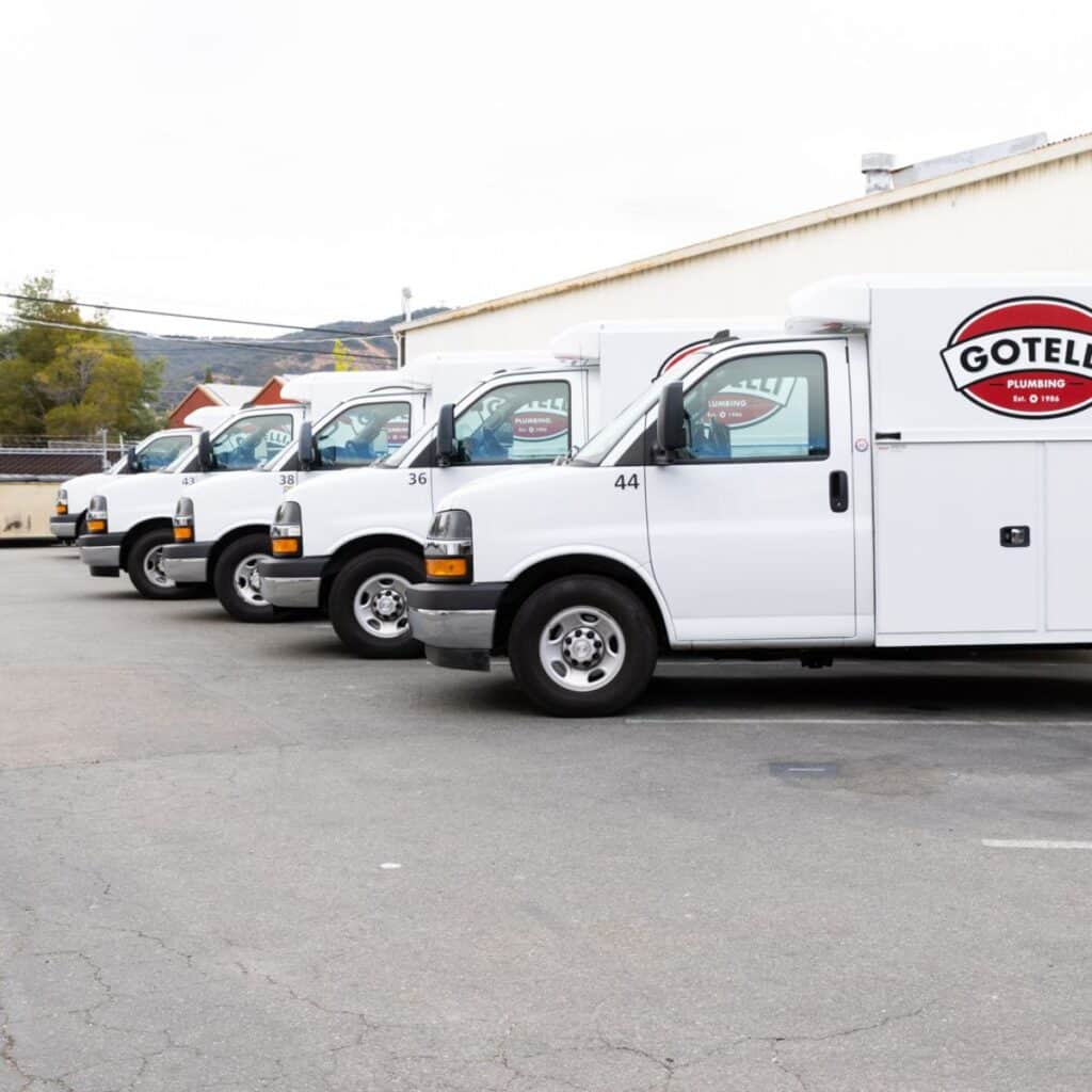 branded Gotelli vehicles parked side by side outside of a San Rafael building
