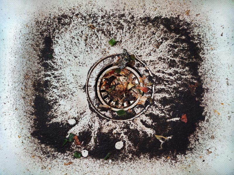 garbage disposal filled with food waste